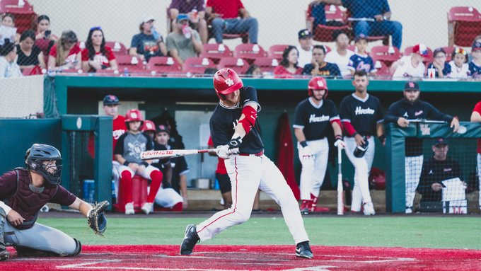 Cameron Nickens drives in a run for Team White in a Fall scrimmage.